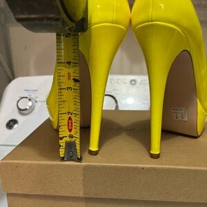 Neon yellow stilettos.
